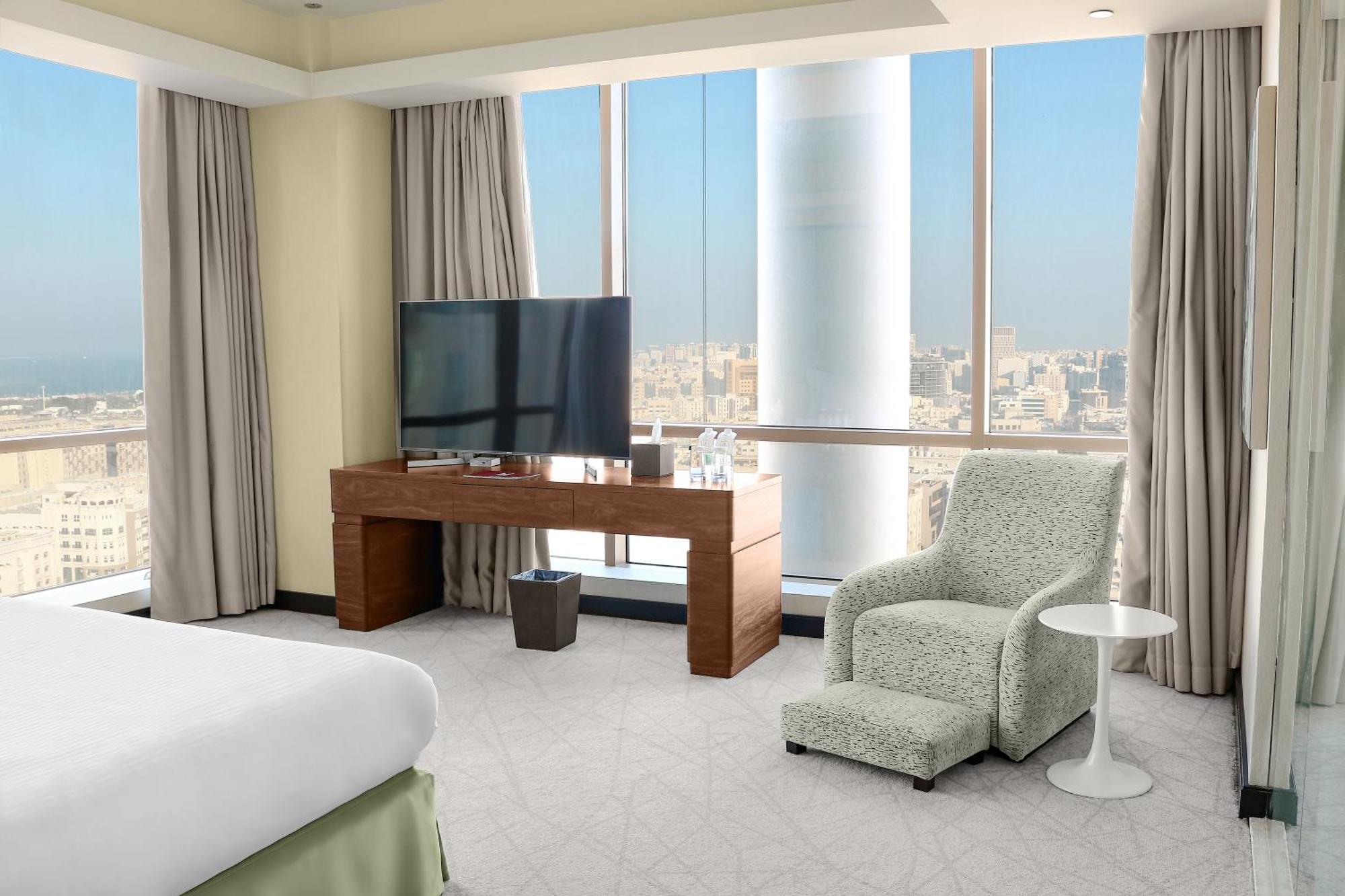 Hotel Millennium Plaza Doha Exterior foto A room at the hotel