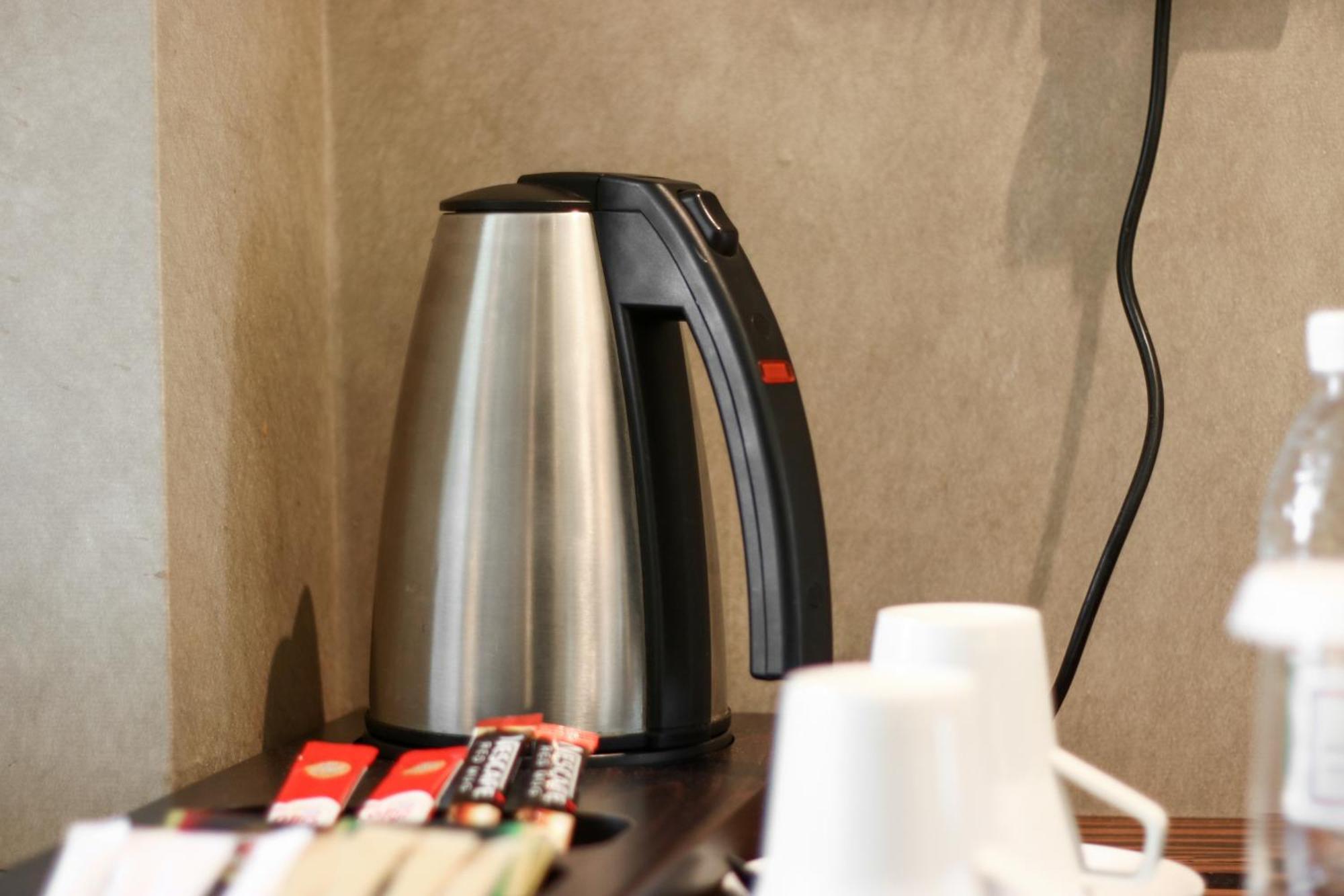 Hotel Millennium Plaza Doha Exterior foto A kettle